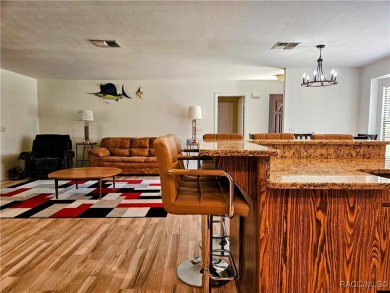 Welcome to Rainbow Springs! This charming 2-bedroom, 2-bath home on Rainbows End Golf Club in Florida - for sale on GolfHomes.com, golf home, golf lot