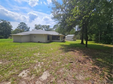Welcome to Rainbow Springs! This charming 2-bedroom, 2-bath home on Rainbows End Golf Club in Florida - for sale on GolfHomes.com, golf home, golf lot