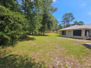 Welcome to Rainbow Springs! This charming 2-bedroom, 2-bath home on Rainbows End Golf Club in Florida - for sale on GolfHomes.com, golf home, golf lot