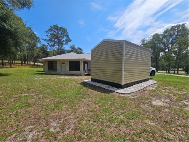 Welcome to Rainbow Springs! This charming 2-bedroom, 2-bath home on Rainbows End Golf Club in Florida - for sale on GolfHomes.com, golf home, golf lot