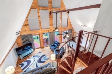 Welcome to your dream Lodge-like home nestled on a sprawling on Raintree Country Club in Missouri - for sale on GolfHomes.com, golf home, golf lot