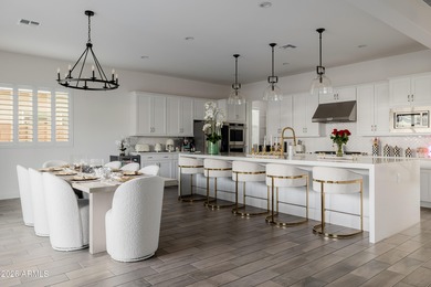 Indulge in refined luxury in this extraordinary Toll Brothers on Sterling Grove Golf & Country Club in Arizona - for sale on GolfHomes.com, golf home, golf lot