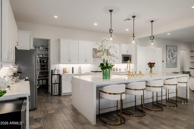 Indulge in refined luxury in this extraordinary Toll Brothers on Sterling Grove Golf & Country Club in Arizona - for sale on GolfHomes.com, golf home, golf lot