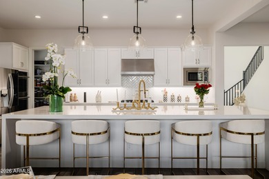 Indulge in refined luxury in this extraordinary Toll Brothers on Sterling Grove Golf & Country Club in Arizona - for sale on GolfHomes.com, golf home, golf lot