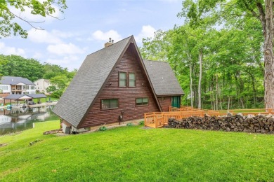 Welcome to your dream Lodge-like home nestled on a sprawling on Raintree Country Club in Missouri - for sale on GolfHomes.com, golf home, golf lot