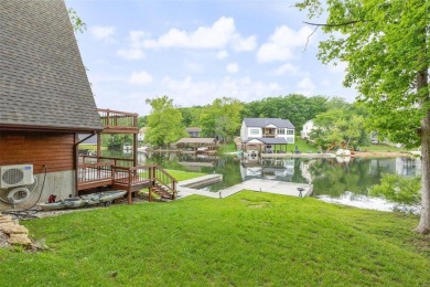 Welcome to your dream Lodge-like home nestled on a sprawling on Raintree Country Club in Missouri - for sale on GolfHomes.com, golf home, golf lot