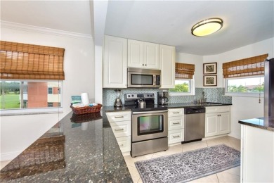 This beautifully and completely remodeled corner unit featuring on Hibiscus Golf Club in Florida - for sale on GolfHomes.com, golf home, golf lot