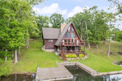 Welcome to your dream Lodge-like home nestled on a sprawling on Raintree Country Club in Missouri - for sale on GolfHomes.com, golf home, golf lot