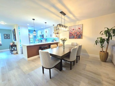 Experience breathtaking lakefront living in this stunning on Boca Lago Golf and Country Club in Florida - for sale on GolfHomes.com, golf home, golf lot