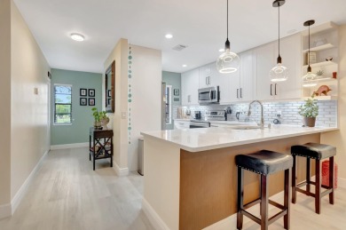 Experience breathtaking lakefront living in this stunning on Boca Lago Golf and Country Club in Florida - for sale on GolfHomes.com, golf home, golf lot