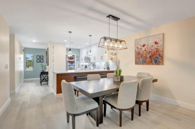 Experience breathtaking lakefront living in this stunning on Boca Lago Golf and Country Club in Florida - for sale on GolfHomes.com, golf home, golf lot