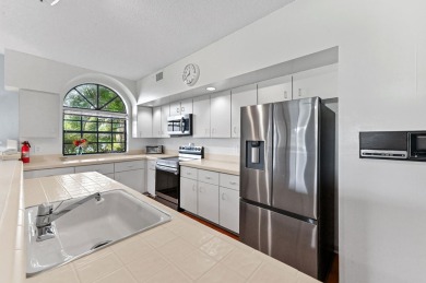 Welcome to 8073 Aberdeen Drive, a splendid real estate on Aberdeen Golf and Country Club in Florida - for sale on GolfHomes.com, golf home, golf lot