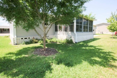 Welcome to your dream home. This beautiful and popular Admiral on Water Oak Country Club Estates in Florida - for sale on GolfHomes.com, golf home, golf lot