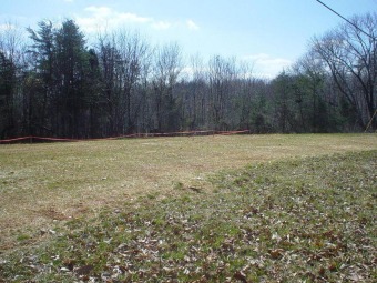 This partial wooded and cleared lot located just across the on The Waterfront Country Club in Virginia - for sale on GolfHomes.com, golf home, golf lot
