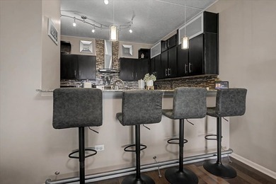 Luxury living at the Residences at Seven Bridges! Boasting 1759 on Seven Bridges Golf Club in Illinois - for sale on GolfHomes.com, golf home, golf lot