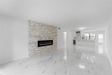 Fully renovated 2-Bed, 2-Bath Condo in 55+Community at WYNMOOR on Wynmoor Golf Course in Florida - for sale on GolfHomes.com, golf home, golf lot