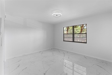 Fully renovated 2-Bed, 2-Bath Condo in 55+Community at WYNMOOR on Wynmoor Golf Course in Florida - for sale on GolfHomes.com, golf home, golf lot