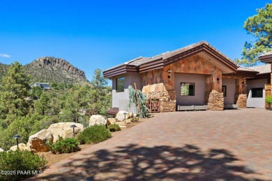Perched on 1.4 wooded acres is a stunning Sedona red-rock home on Capital Canyon Club in Arizona - for sale on GolfHomes.com, golf home, golf lot
