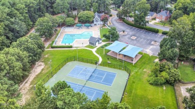 This Hedingham home truly has it all. Flooded with natural light on Hedingham Golf and Athletic Club in North Carolina - for sale on GolfHomes.com, golf home, golf lot