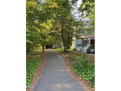 This Hedingham home truly has it all. Flooded with natural light on Hedingham Golf and Athletic Club in North Carolina - for sale on GolfHomes.com, golf home, golf lot