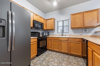 Located within the sought-after Augusta Ranch golf community on Augusta Ranch Golf Club in Arizona - for sale on GolfHomes.com, golf home, golf lot