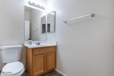 Located within the sought-after Augusta Ranch golf community on Augusta Ranch Golf Club in Arizona - for sale on GolfHomes.com, golf home, golf lot