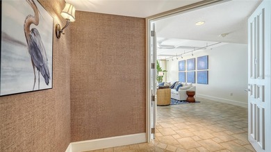 Enjoy elevated island living in this beautiful residence in on Longboat Key Golf Club Resort in Florida - for sale on GolfHomes.com, golf home, golf lot