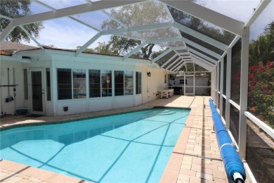 There is so much to love about this beautiful 3 bedroom, 2 bath on The Dunedin Country Club in Florida - for sale on GolfHomes.com, golf home, golf lot