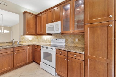Former Model home.  With a Life in VALENCIA LAKES, one of on Caloosa Greens Executive Golf Course in Florida - for sale on GolfHomes.com, golf home, golf lot