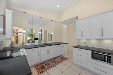 Rarely available golf course villa with full impact windows and on Wycliffe Golf and Country Club in Florida - for sale on GolfHomes.com, golf home, golf lot