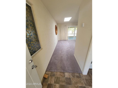 SUPER CLEAN 2 BED 2 BATH  END UNIT WITH A GARAGE &AZ ROOM TOO on Sun City South Golf Course in Arizona - for sale on GolfHomes.com, golf home, golf lot