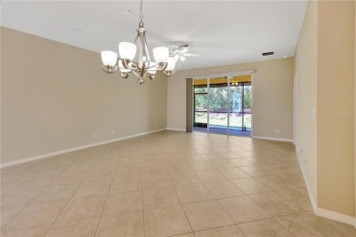 Former Model home.  With a Life in VALENCIA LAKES, one of on Caloosa Greens Executive Golf Course in Florida - for sale on GolfHomes.com, golf home, golf lot