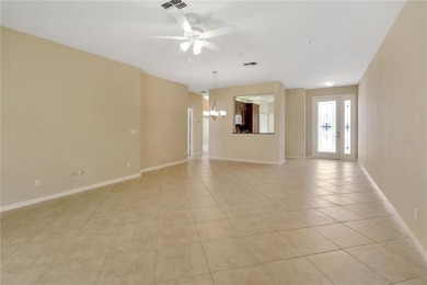 Former Model home.  With a Life in VALENCIA LAKES, one of on Caloosa Greens Executive Golf Course in Florida - for sale on GolfHomes.com, golf home, golf lot