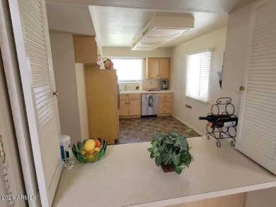 SUPER CLEAN 2 BED 2 BATH  END UNIT WITH A GARAGE &AZ ROOM TOO on Sun City South Golf Course in Arizona - for sale on GolfHomes.com, golf home, golf lot
