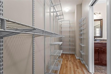 **Downsize without compromise and enjoy easy, lock-and-leave on The Golf Club of Georgia in Georgia - for sale on GolfHomes.com, golf home, golf lot