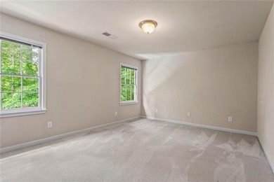 **Downsize without compromise and enjoy easy, lock-and-leave on The Golf Club of Georgia in Georgia - for sale on GolfHomes.com, golf home, golf lot