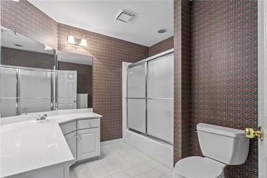 **Downsize without compromise and enjoy easy, lock-and-leave on The Golf Club of Georgia in Georgia - for sale on GolfHomes.com, golf home, golf lot