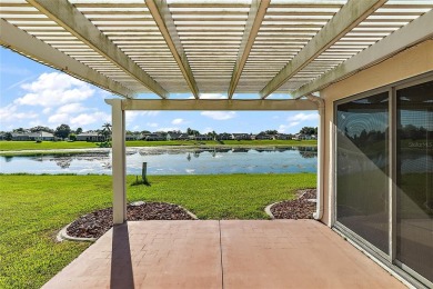 Welcome to this WATERFRONT 3/2 LANTANA model home with on El Diablo Executive Golf Course in Florida - for sale on GolfHomes.com, golf home, golf lot