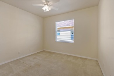 Former Model home.  With a Life in VALENCIA LAKES, one of on Caloosa Greens Executive Golf Course in Florida - for sale on GolfHomes.com, golf home, golf lot