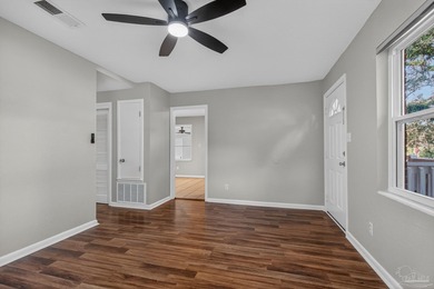 Refreshed and move-in ready, this three-bedroom, cottage-style on Osceola Municipal Golf Course in Florida - for sale on GolfHomes.com, golf home, golf lot