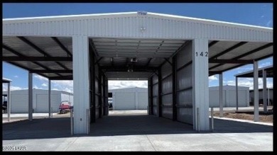 Discover a one-of-a-kind lifestyle at Riverbound Custom Storage on The Refuge Golf and Country Club in Arizona - for sale on GolfHomes.com, golf home, golf lot