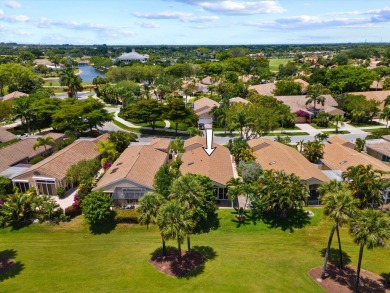 Rarely available golf course villa with full impact windows and on Wycliffe Golf and Country Club in Florida - for sale on GolfHomes.com, golf home, golf lot