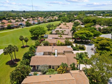 Rarely available golf course villa with full impact windows and on Wycliffe Golf and Country Club in Florida - for sale on GolfHomes.com, golf home, golf lot