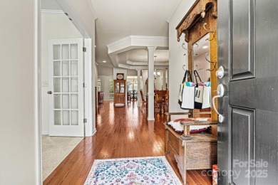 Custom-crafted by Bellamy Homes, this sprawling RANCH is a true on Cowans Ford Country Club in North Carolina - for sale on GolfHomes.com, golf home, golf lot