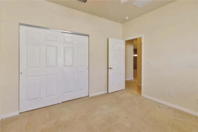 Former Model home.  With a Life in VALENCIA LAKES, one of on Caloosa Greens Executive Golf Course in Florida - for sale on GolfHomes.com, golf home, golf lot