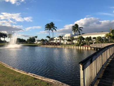 Rarely available golf course villa with full impact windows and on Wycliffe Golf and Country Club in Florida - for sale on GolfHomes.com, golf home, golf lot