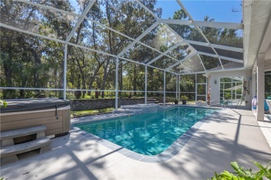 Value-Packed Cypress Village Pool Home with Endless Entertaining on Sugarmill Woods Golf and Country Club in Florida - for sale on GolfHomes.com, golf home, golf lot