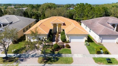 Former Model home.  With a Life in VALENCIA LAKES, one of on Caloosa Greens Executive Golf Course in Florida - for sale on GolfHomes.com, golf home, golf lot