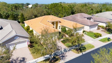 Former Model home.  With a Life in VALENCIA LAKES, one of on Caloosa Greens Executive Golf Course in Florida - for sale on GolfHomes.com, golf home, golf lot