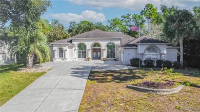 Value-Packed Cypress Village Pool Home with Endless Entertaining on Sugarmill Woods Golf and Country Club in Florida - for sale on GolfHomes.com, golf home, golf lot